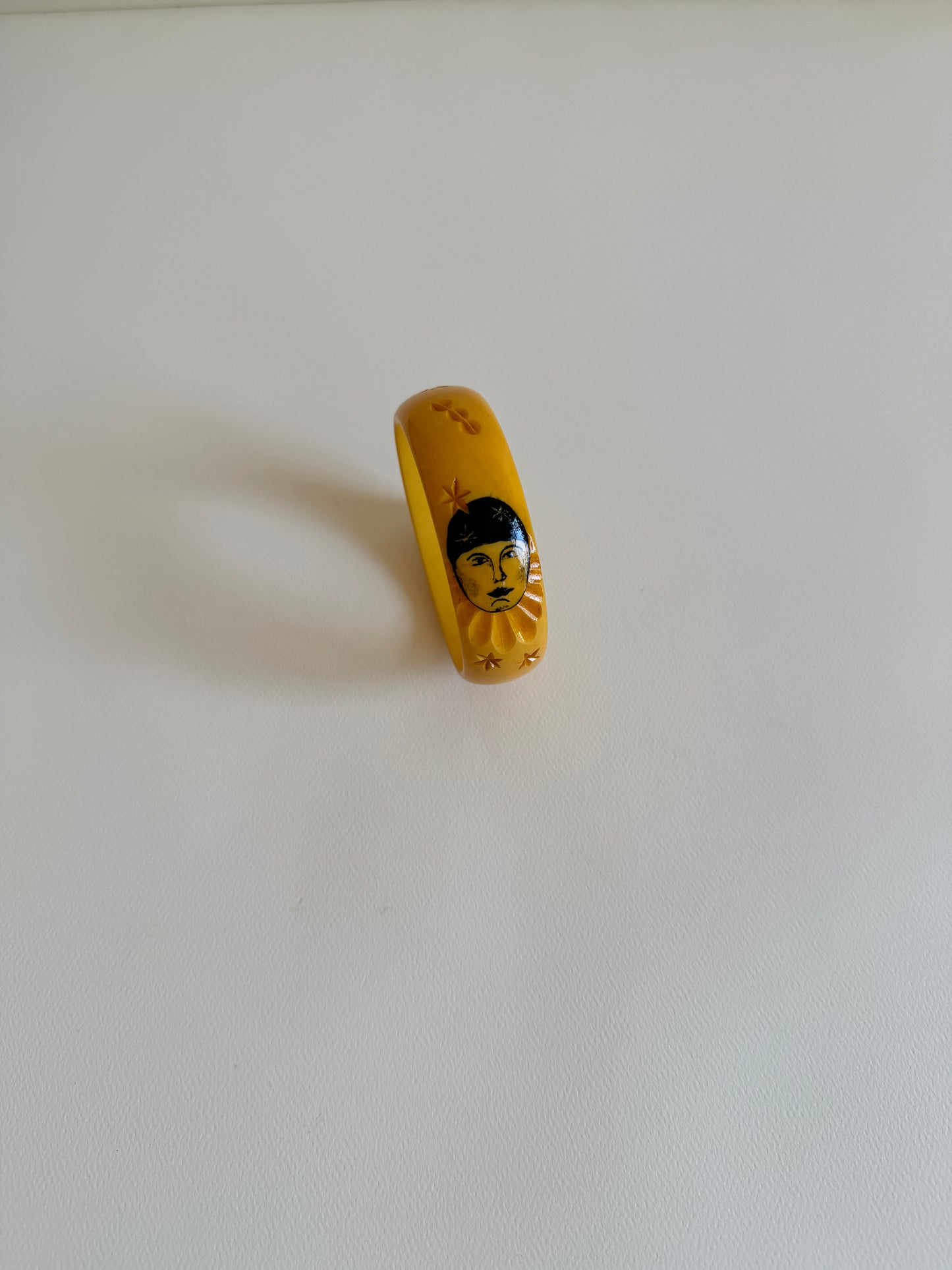 Art Deco Carved Bakelite Pierrot Bangle