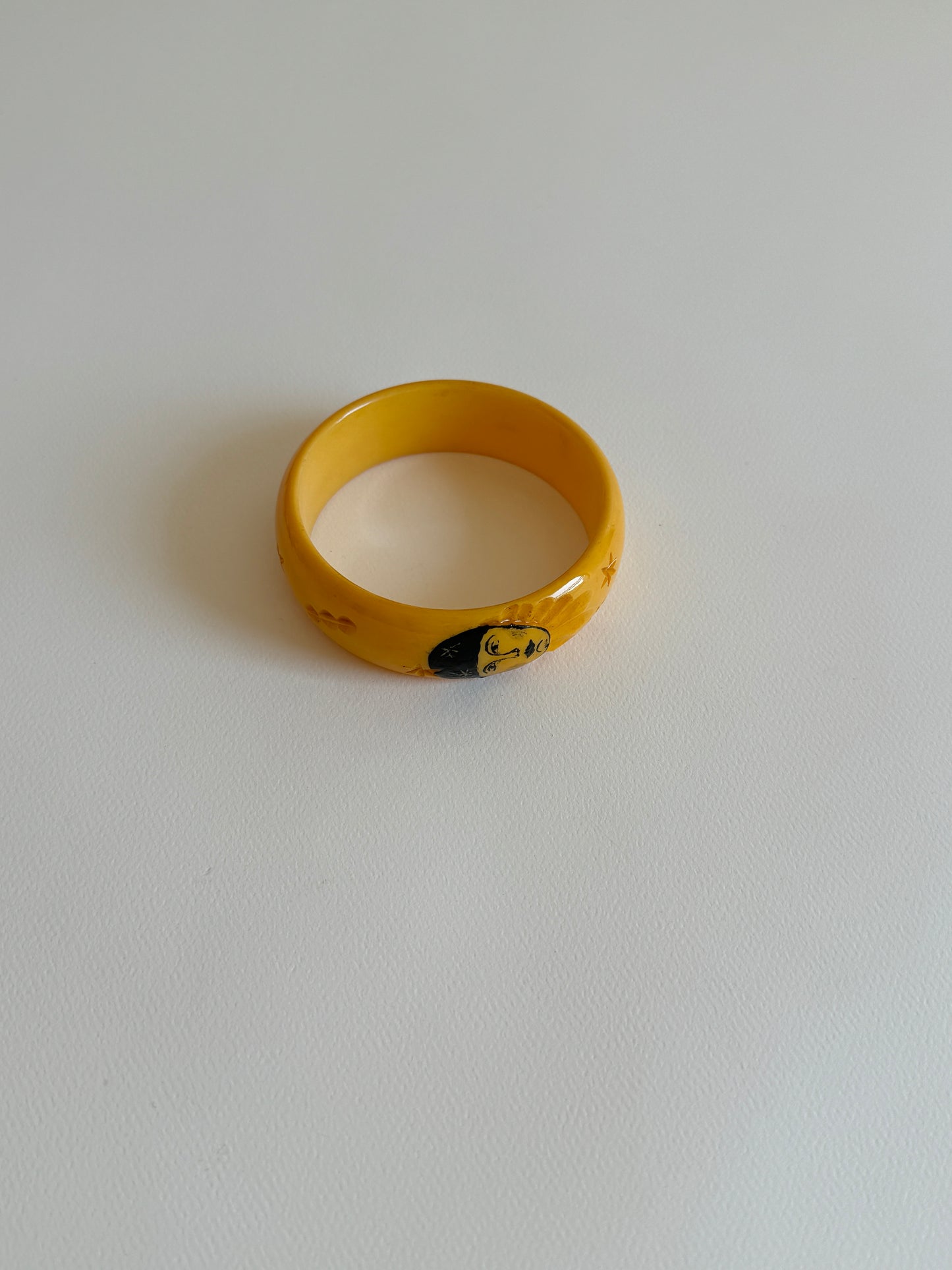 Art Deco Carved Bakelite Pierrot Bangle