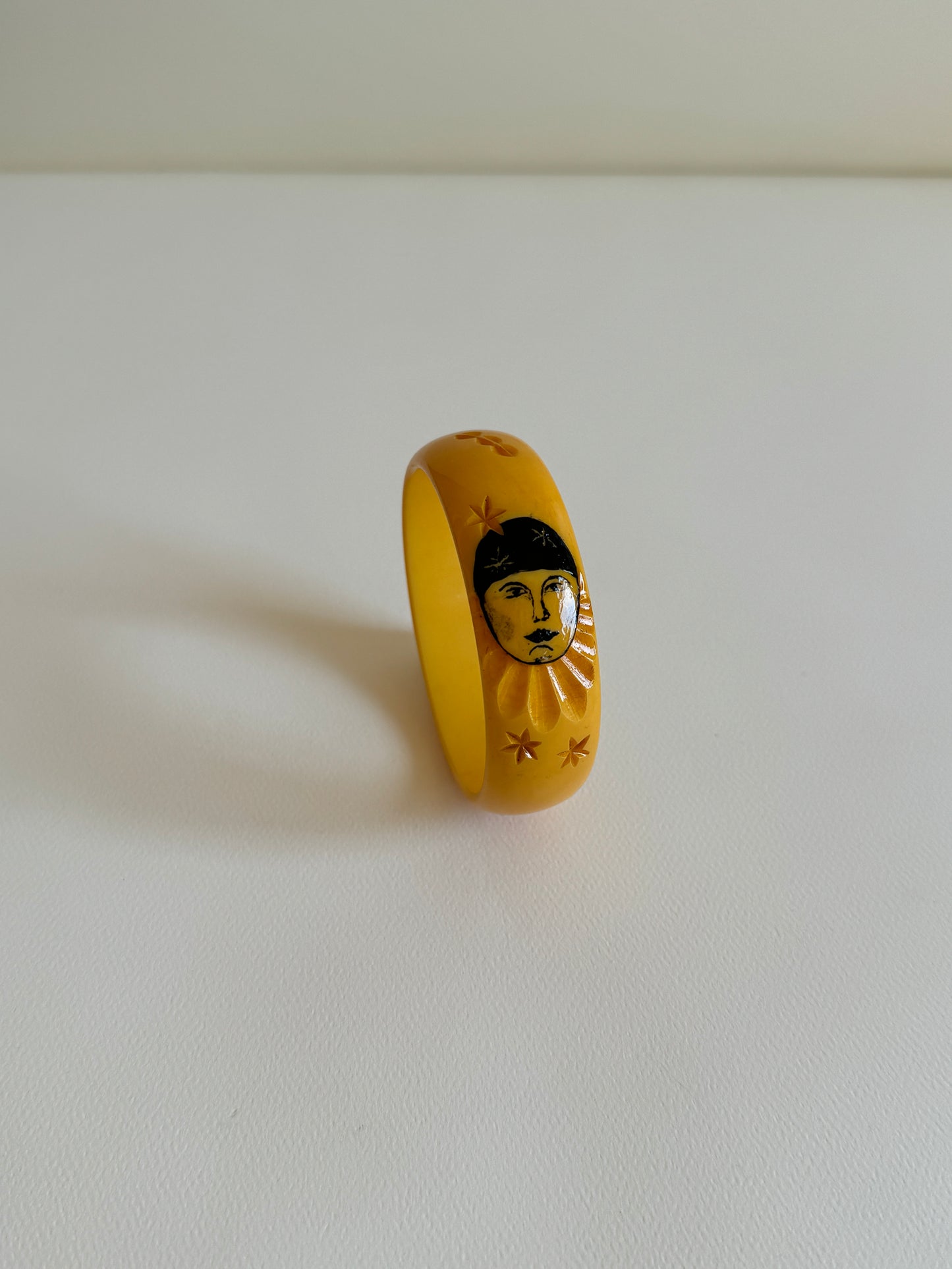 Art Deco Carved Bakelite Pierrot Bangle